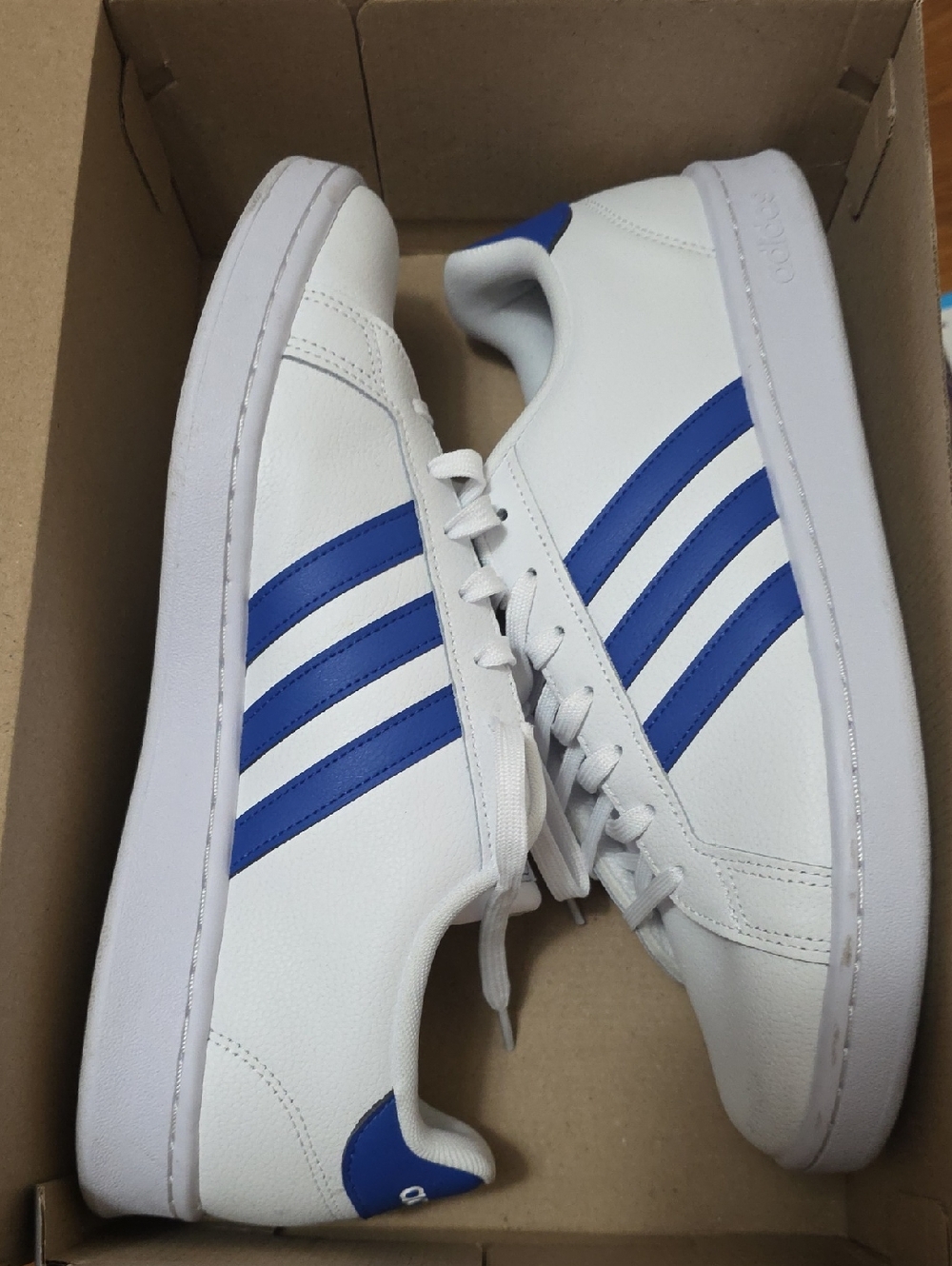 adidas White Sneakers with Blue Three-Stripes
